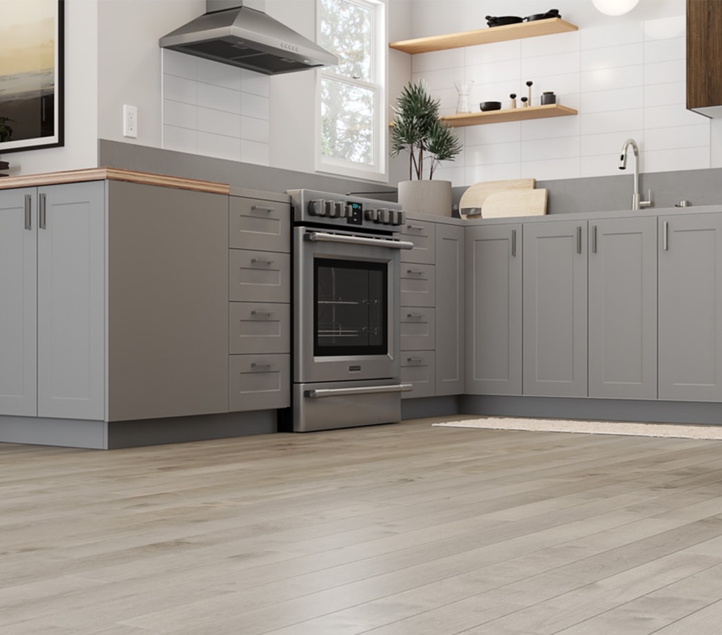 Modern kitchen with greyish brown flooring
