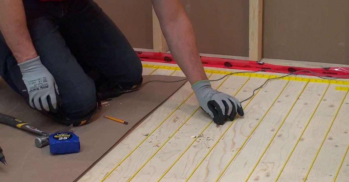 Installing a heated floor cable system
