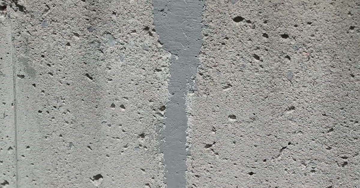 Repairing cracks in concrete