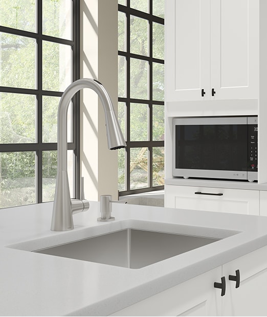Stainless steel kitchen sink and faucet