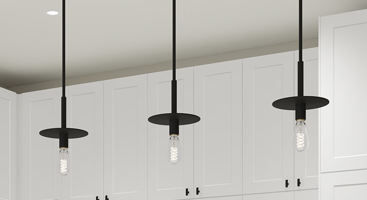 Matte black lighting fixtures with Edison light bulbs